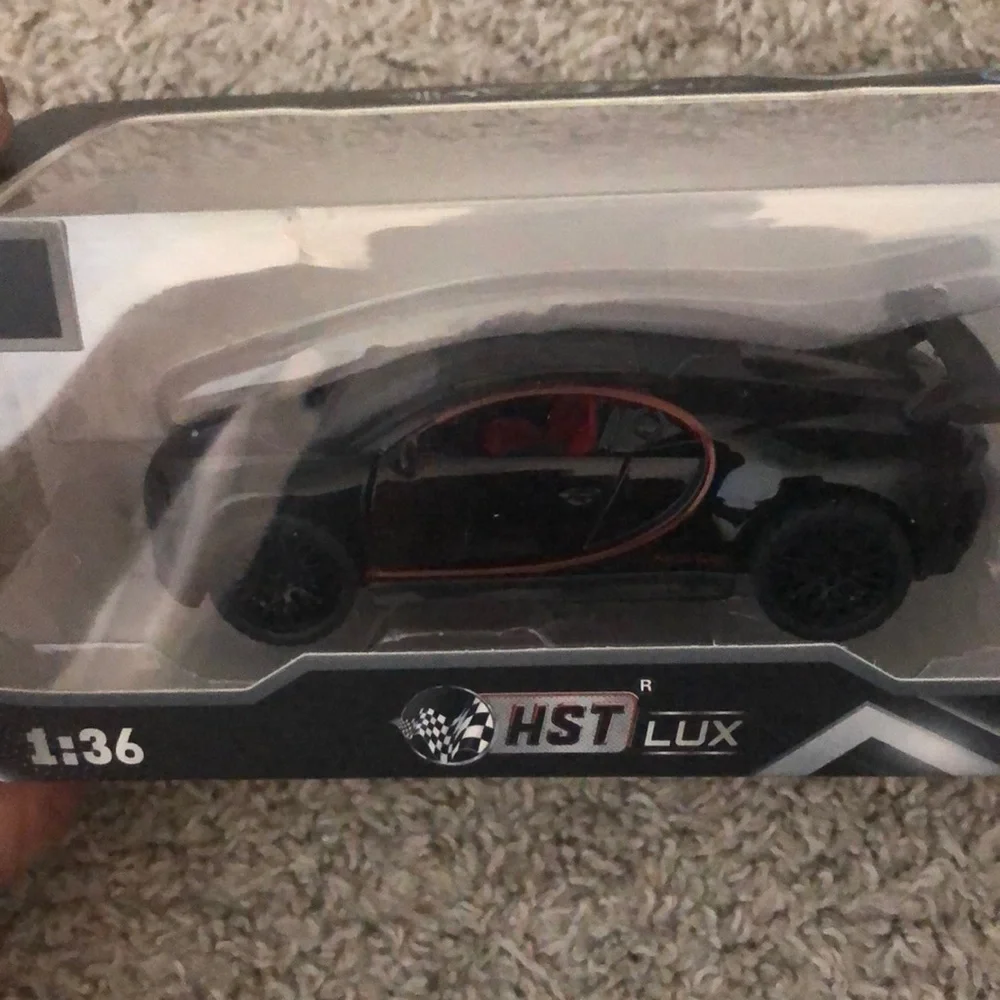 HST Lux Black and Red Diecast Car Model